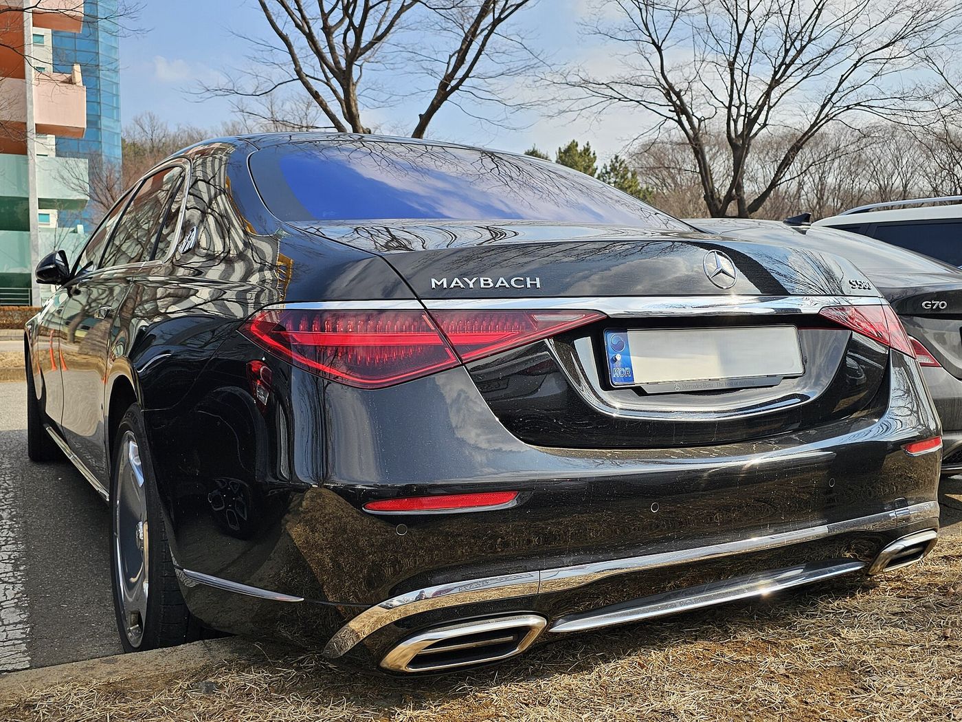 Rear of a black Mercedes-Maybach showing the Maybach badge